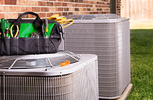 AC units behind a house