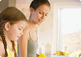 Daughter and Mother Washing the Dishes Together